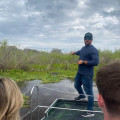 How Do Guides Educate Visitors On A Swamp Tour In Florida?